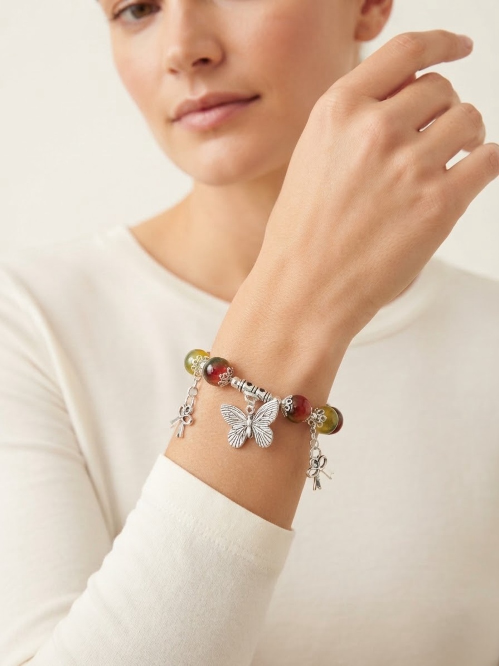 Silver Butterfly Charm Bead Bracelet in Green and Red